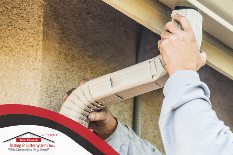 Expert installing gutter guards on San Rafael seamless gutters for fall leaf protection.