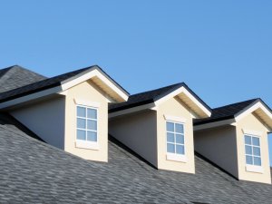 Close-up of a dormer roof installation in Sausalito, highlighting the detailed work of Ken Cooper Roofing.


