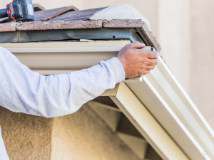 Close-up of seamless gutter system installation in Larkspur