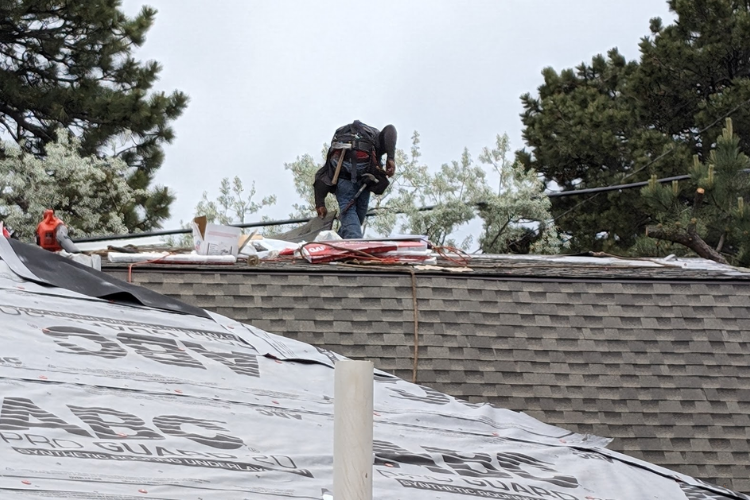 Roofing contractor performing San Rafael roofing repair during summer
