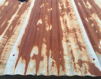 Salt corrosion on roof flashing in Tiburon, CA, from coastal weather exposure