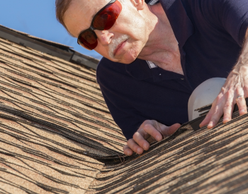 Roof inspection in Tiburon after high winds to check for shingle damage