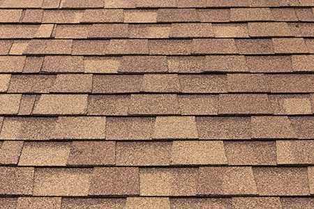 brown asphalt shingles closeup